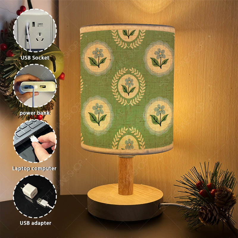 Lampe de chevet USB à médaillons de fleurs bleues sur fond vert