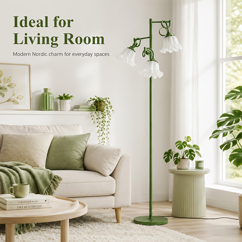 Lampadaire à trois fleurs blanches sur tiges vert sauge flexibles