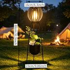 Lampadaire solaire rétro à boule ajourée sur trépied porte-fleurs