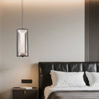 Suspension LED cylindre noir à diffuseur plissé et voile fumé, 29 W