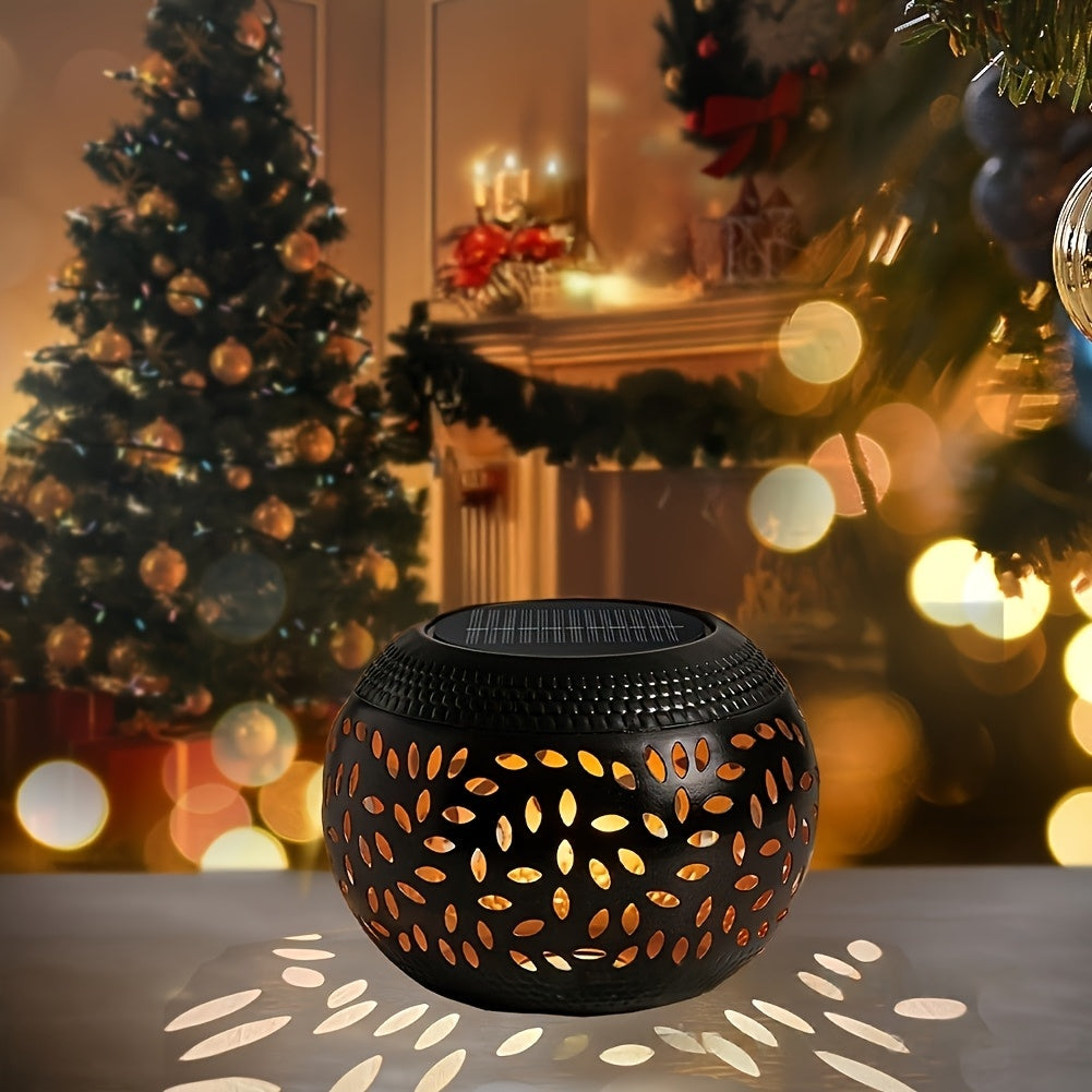 Lampe de table solaire boule en fer ajouré, motif de feuilles