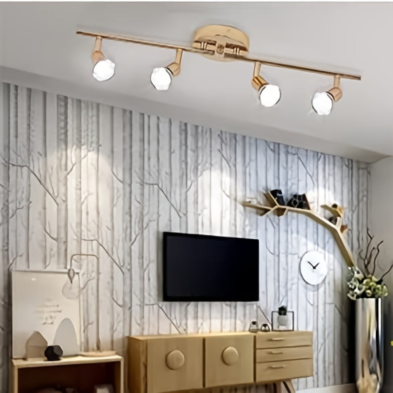 Plafonnier doré à 4 spots GU10 orientables sur rampe de 62 cm
