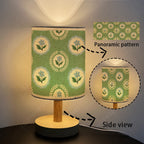 Lampe de chevet USB à médaillons de fleurs bleues sur fond vert