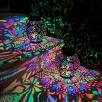 Lanterne solaire boule ajourée finition laiton ou noire, lumière RVB