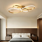 Plafonnier LED à boucles entrelacées 79 cm, noir, argenté ou doré