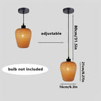 Suspension cocon en bambou ajouré et finitions noires, Ø 16 x H 21 cm