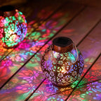 Lanterne solaire boule en métal ajouré, lumière RVB, noire ou cuivrée