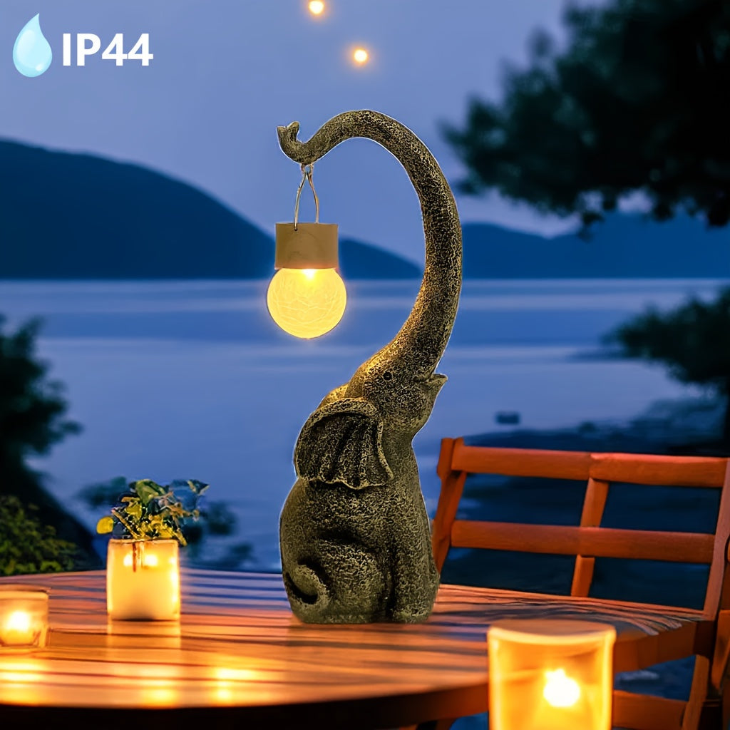 Lampe solaire d'extérieur éléphant en résine dorée, globe craquelé