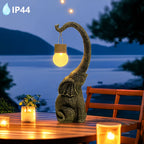 Lampe solaire d'extérieur éléphant en résine dorée, globe craquelé