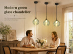 Suspension globe en verre vert nervuré, douille couleur laiton