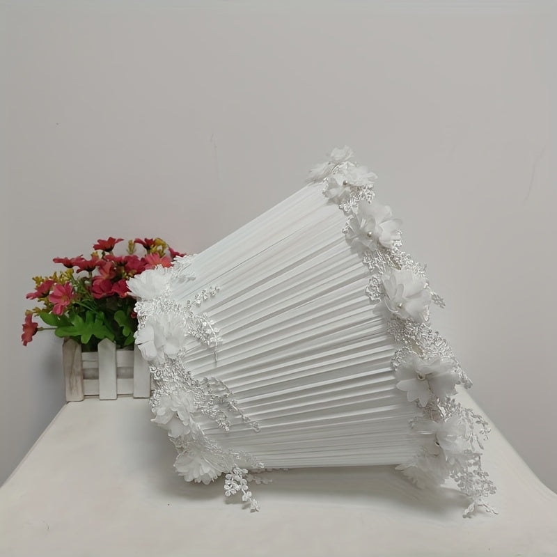 Une coiffeuse de mariée sous une lumière de dentelle
