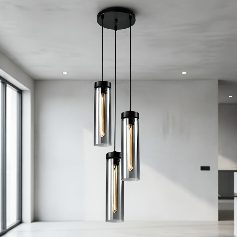 Un luminaire en verre fumé pour salle à manger