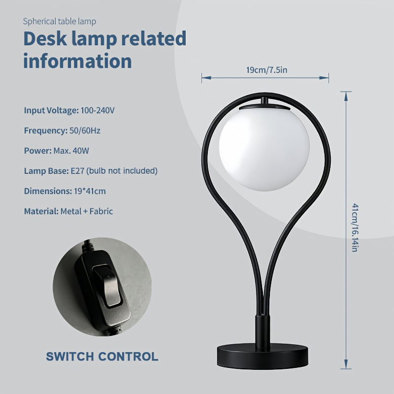 Lampe de chevet noire, globe en verre opalin dans un arceau