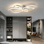 Plafonnier LED à boucles entrelacées 79 cm, noir, argenté ou doré