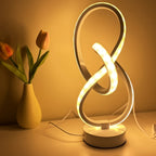 Lampe à poser blanche en ruban LED noué, sculpture lumineuse