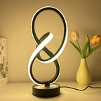 Lampe à poser blanche en ruban LED noué, sculpture lumineuse