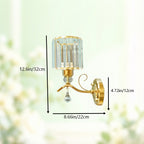 Lot de 2 appliques murales dorées à prismes de cristal et volute