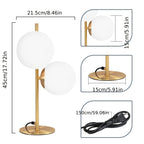Lampe de chevet à deux globes en verre opalin, pied doré ou noir