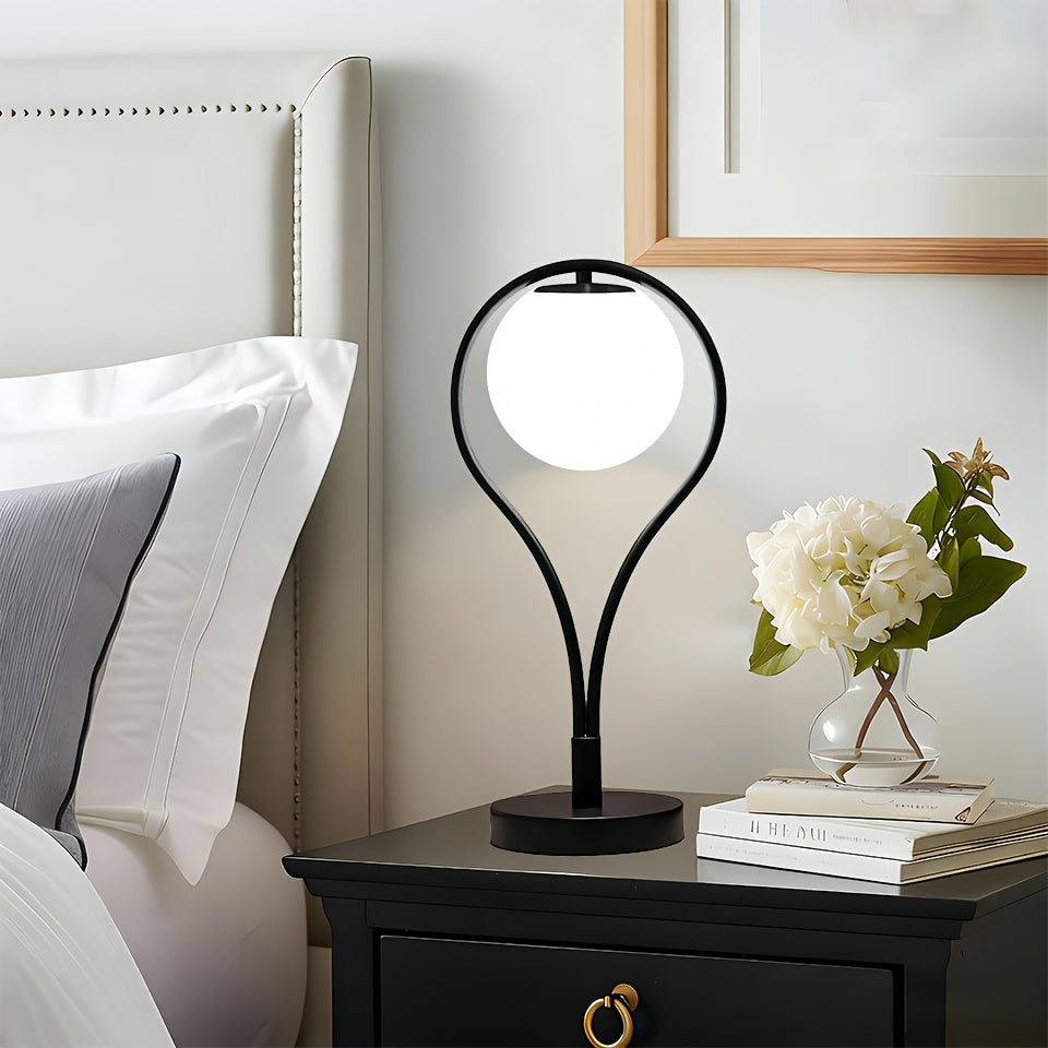 Lampe de chevet noire, globe en verre opalin dans un arceau