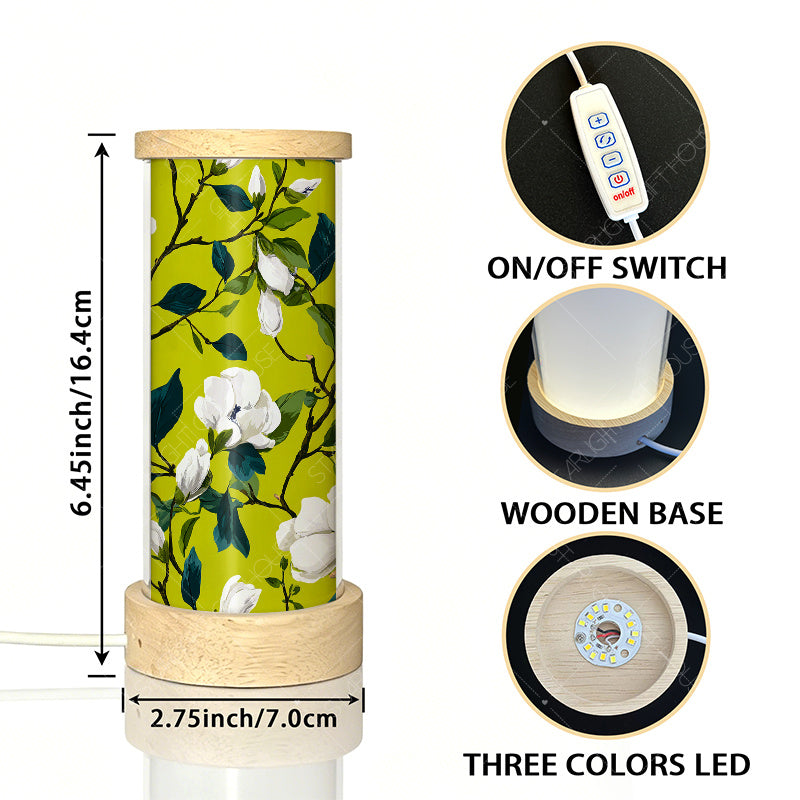 Veilleuse cylindre en acrylique à magnolias sur fond vert anis