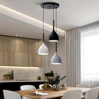 Suspension 3 cloches noire, blanche et grise sur rosace ronde