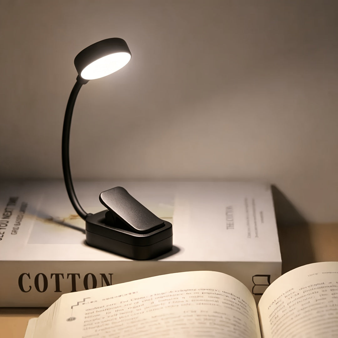 Lampe à pince noire à piles et tête ronde