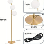 Lampadaire trois boules de verre blanc en cascade, pied doré