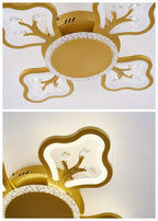 Plafonnier LED fleur à quatre pétales 58 cm, trois teintes