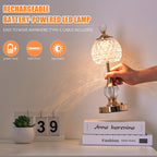 Lampe de table sans fil à dôme facetté et pied doré balustre