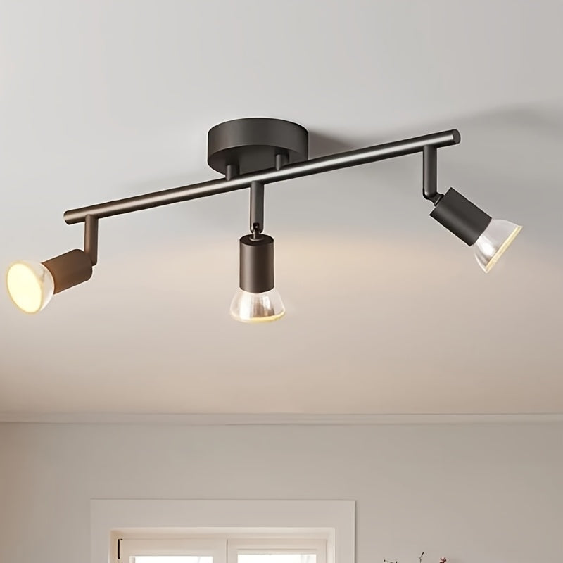 Rampe de trois spots noirs orientables pour la cuisine