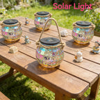Lanterne solaire pot irisé à pastilles en relief et anse en corde