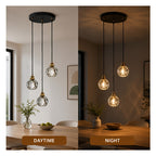 Suspension 3 globes en cristal taillé sur platine noire, câbles 110 cm