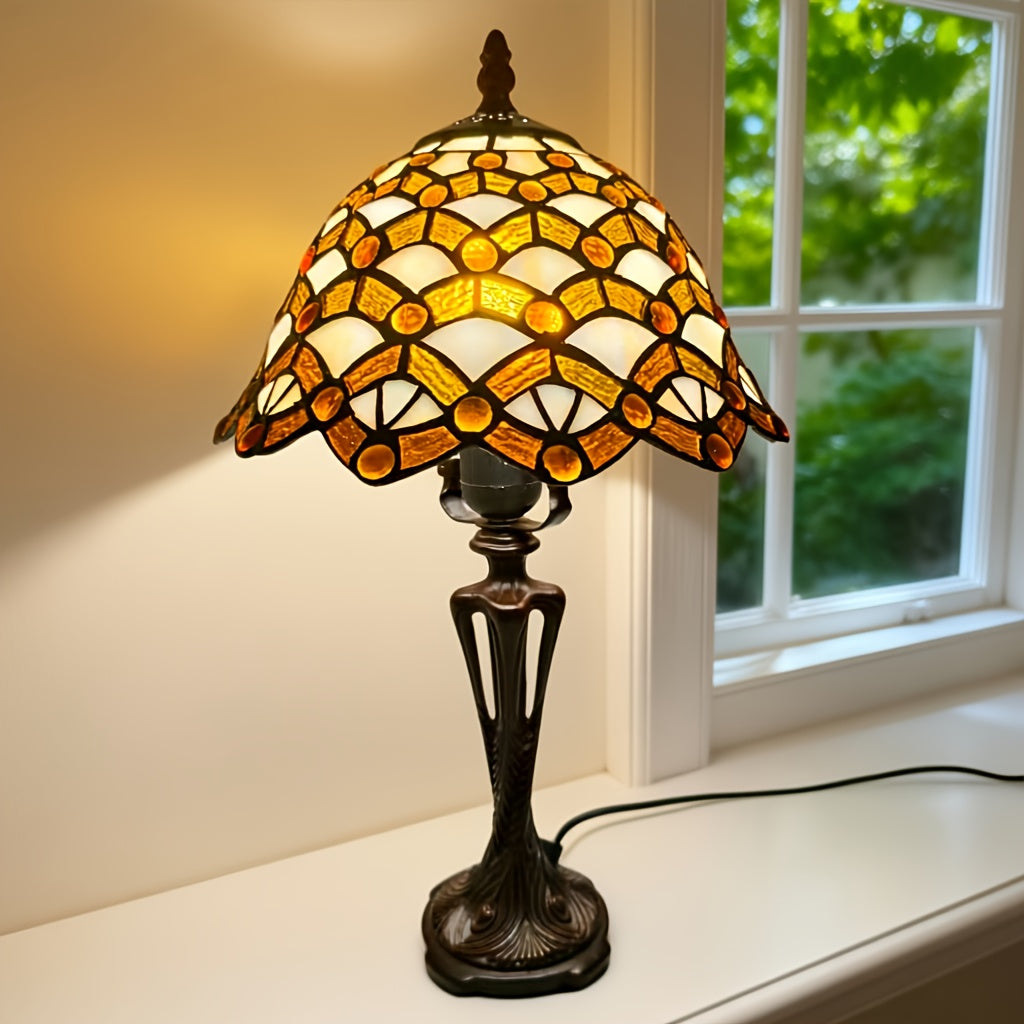 Lampe en vitrail de verre ambré et ivoire serti