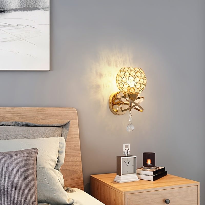 Applique murale globe en cristal doré à rubans entrelacés