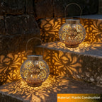 Lot de 2 lanternes solaires boules ajourées dorées, style marocain