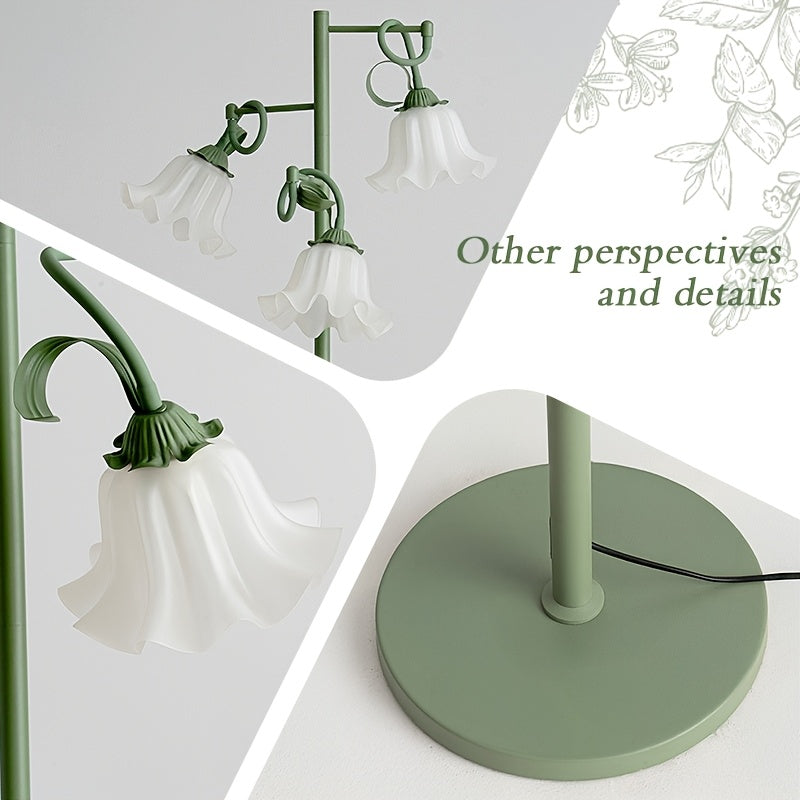Lampadaire à trois fleurs blanches sur tiges vert sauge flexibles
