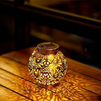 Lot de 2 lanternes solaires boules ajourées dorées, style marocain