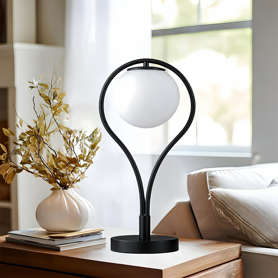 Lampe de chevet noire, globe en verre opalin dans un arceau