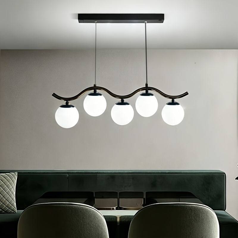 Un luminaire de salle à manger plein de mouvement