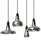 Suspension en verre fumé, quatre silhouettes de 9 à 24 cm, E27