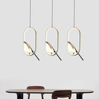 Suspension oiseau LED dans un anneau, ellipse ou cercle doré