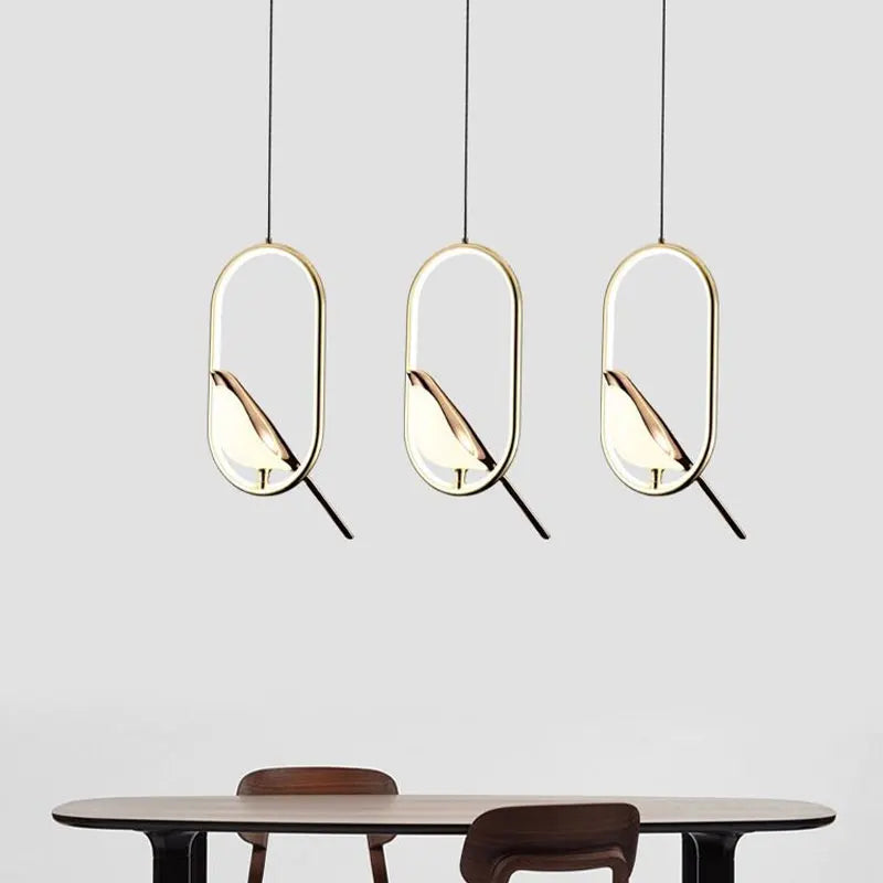 Suspension oiseau LED dans un anneau, ellipse ou cercle doré