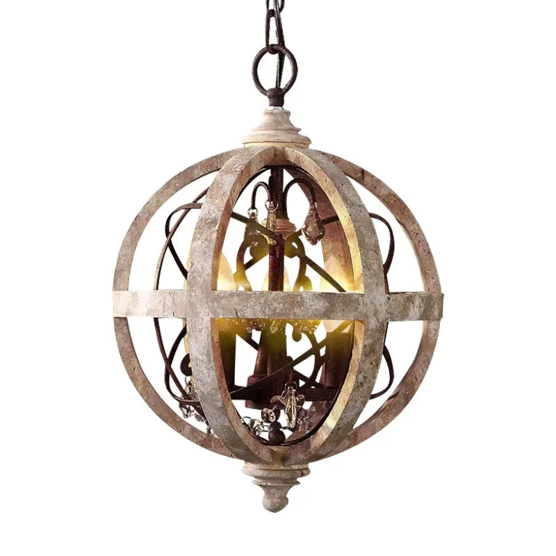 Lustre boule en bois patiné, 3 chandelles E14 et pampilles