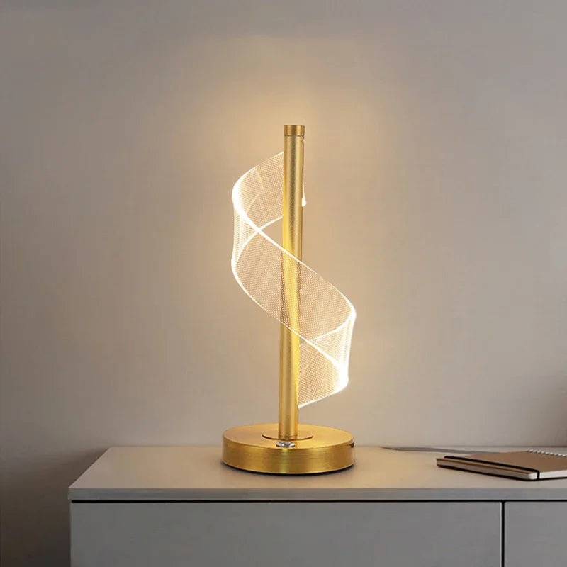 Lampe de table LED spirale en acrylique sur tige dorée, 34 cm
