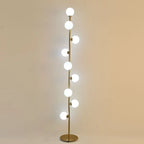 Lampadaire doré à neuf petits globes en verre givré en spirale