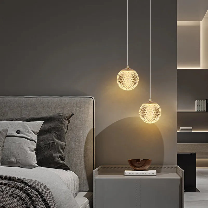Suspension LED globe transparent à facettes losange, finition dorée