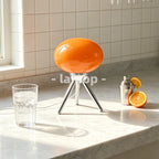 Lampe de chevet ovale en verre orange sur trépied chromé, 27 cm
