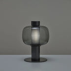 Lampe lanterne en verre et cylindre de métal perforé, 42 cm