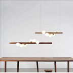 Suspension en bois et globes de verre opalin, 5 ou 7 lumières