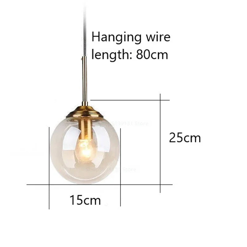 Petite suspension globe en verre Ø 15 cm, tube doré, câble 80 cm